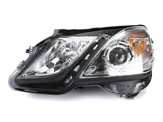 Mercedes Headlight Assembly - Driver Side (Halogen) 2128209561 - Hella 010800071